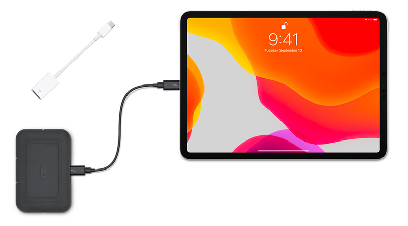 Conecte o iPad à unidade externa com adaptador USB